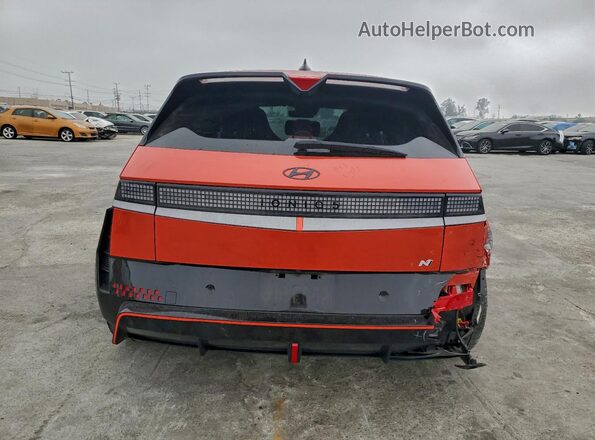 KM8KNDA85SU004574 2025 HYUNDAI IONIQ Orange Вид ззаду