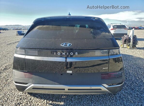 KM8KNDDF3RU288744 2024 HYUNDAI IONIQ Black Widok z tyłu