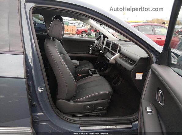 KM8KRDAF2PU211319 2023 HYUNDAI IONIQ 5 Blue Front interior view
