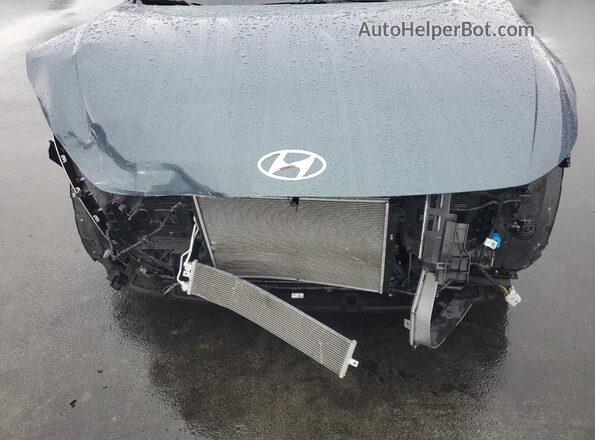 KM8KRDAF9PU146601 2023 HYUNDAI IONIQ Gray Vista interior trasera