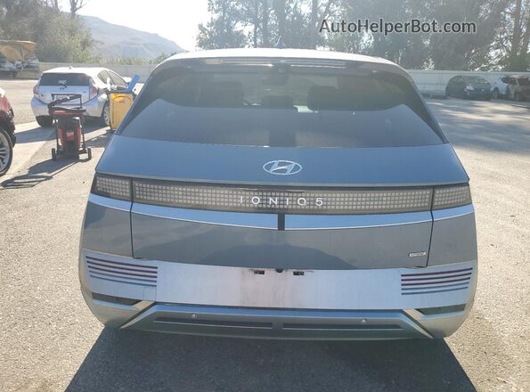 KM8KRDDF3RU296427 2024 HYUNDAI IONIQ Blue Հետևի տեսք