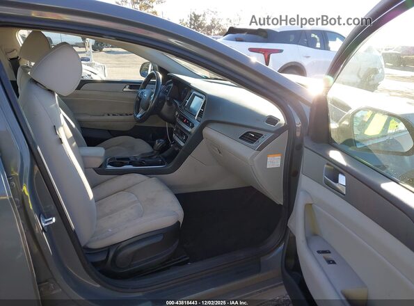 KMHE24L33KA093599 2019 HYUNDAI SONATA HYBRID Gray წინა სალონის ხედი