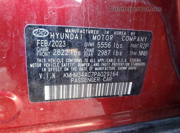 KMHM34AC7PA029164 2023 HYUNDAI IONIQ Maroon Vista del compartimento del motor