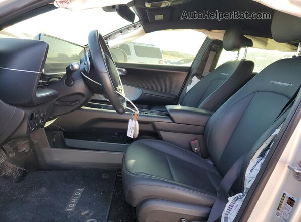 KMHM34AC7PA043159 2023 HYUNDAI IONIQ Silver Front interior view
