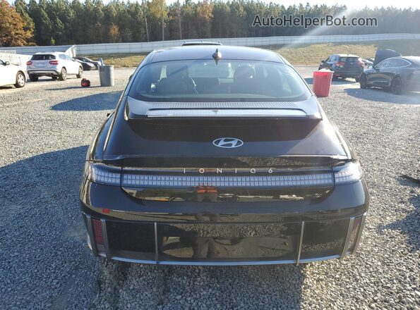 KMHM54AC5RA063214 2024 HYUNDAI IONIQ Black Rear view