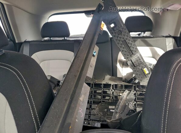 KMHRC8A33LU035758 2020 HYUNDAI VENUE Black Rear seats view