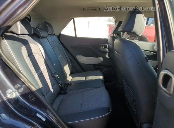 KMHRC8A38PU260313 2023 HYUNDAI VENUE Blue Rear interior view