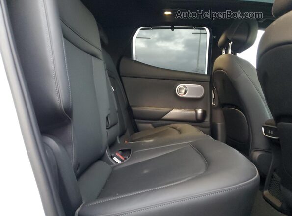 KMUKCDTC1PU018780 2023 GENESIS GV60 White Rear interior view