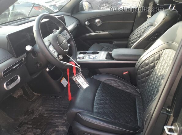 KMUKCDTC4PU012844 2023 GENESIS GV60 Green Widok wnętrza z przodu