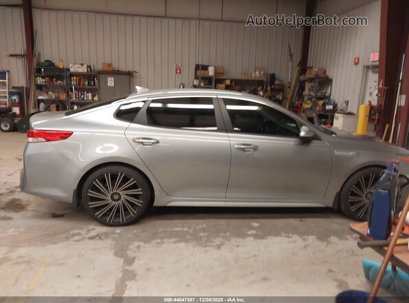 KNAGU4LE5H5014568 2017 KIA OPTIMA HYBRID Green Vista interior trasera