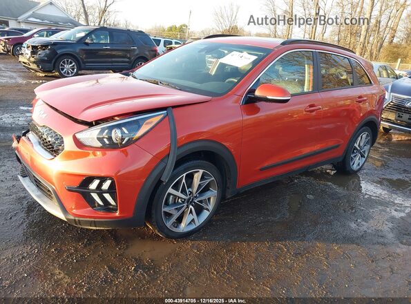 KNDCC3LC7N5536837 2022 KIA NIRO Orange Vista tres cuartos delantera izquierda