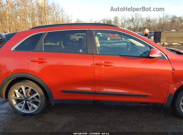 KNDCC3LC7N5536837 2022 KIA NIRO Orange Vista interior trasera