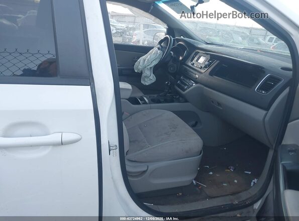 KNDMB5C18G6103705 2016 KIA SEDONA Белый Вид салона спереди