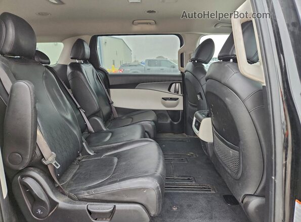 KNDNB4H34P6214907 2023 KIA CARNIVAL Black უკანა სალონის ხედი