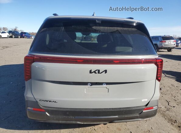 KNDNE5KA8S6050932 2025 KIA CARNIVAL Серый Вид сзади