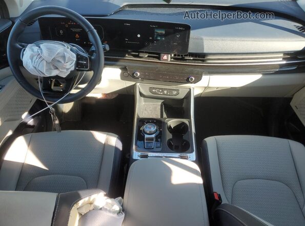 KNDNE5KA8S6050932 2025 KIA CARNIVAL Серый Вид панели приборов