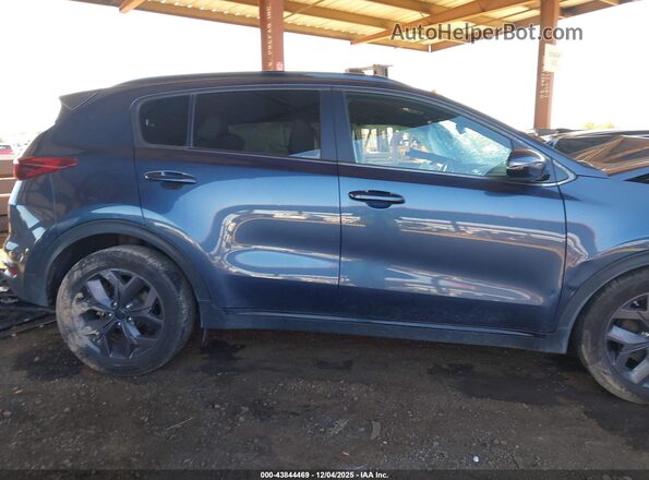 KNDP63AC9N7011830 2022 KIA SPORTAGE Blue Widok wnętrza z tyłu