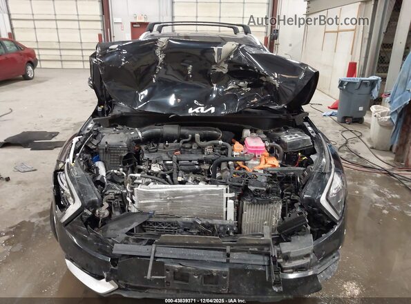KNDPVCAG9P7098198 2023 KIA SPORTAGE HYBRID Black Front view
