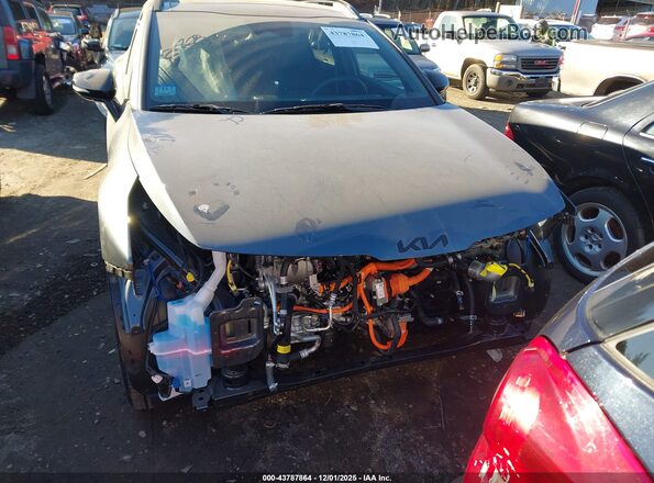 KNDPVDDG4T7305396 2026 KIA SPORTAGE HYBRID Серый Вид щитка приборов