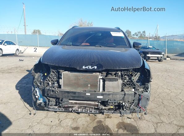 KNDPXCAG8P7021607 2023 KIA SPORTAGE HYBRID Black Вид задньої частини салону
