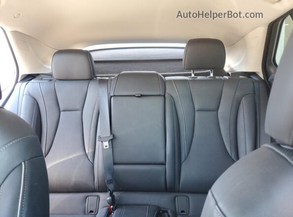 LRBFZNR40MD071974 2021 BUICK ENVISION Red Vista de los asientos traseros
