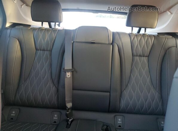 LRBFZRR49PD031369 2023 BUICK ENVISION Black Widok tylnych siedzeń