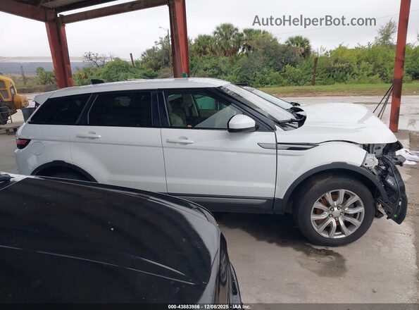 SALVP2RX4KH331609 2019 LAND ROVER RANGE ROVER EVOQUE White Vista interior trasera