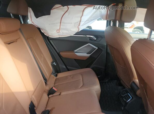 WA1DECF30M1054382 2021 AUDI Q3 Black Вид задньої частини салону