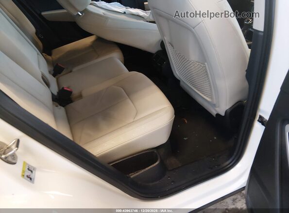 WA1EECF35M1002265 2021 AUDI Q3 White VIN კოდის სტიკერის ხედი