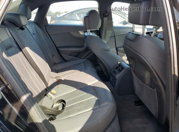 WAUEAAF46MN005471 2021 AUDI OTHER Black Vista de los asientos traseros