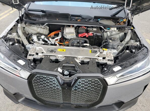 WB523CF09RCR22878 2024 BMW IX Gray Vista interior trasera