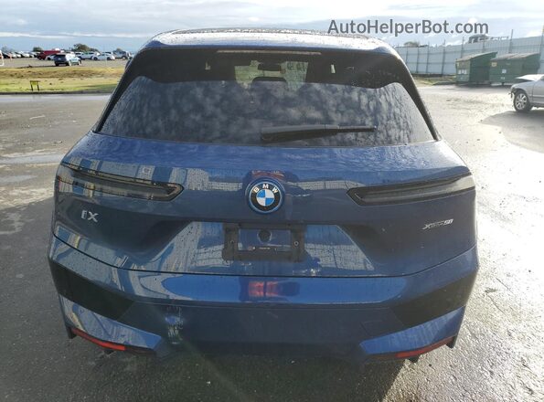 WB523CF09SCT11562 2025 BMW IX Blue Հետևի տեսք