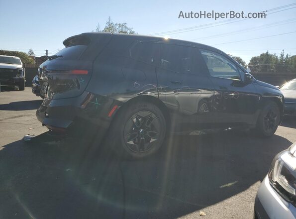 WB543CF09TCV29561 2026 BMW IX Black Задня права чверть