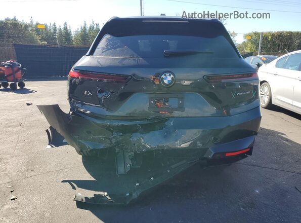 WB543CF09TCV29561 2026 BMW IX Black Вид ззаду