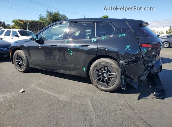 WB543CF09TCV29561 2026 BMW IX Black Задня ліва чверть