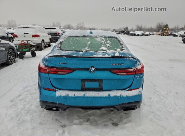 WBA13AL08M7H63944 2021 BMW M2 Teal Widok z tyłu