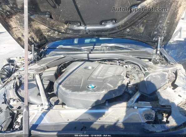 WBA13AW05NFM24588 2022 BMW OTHER Black Вид ззаду