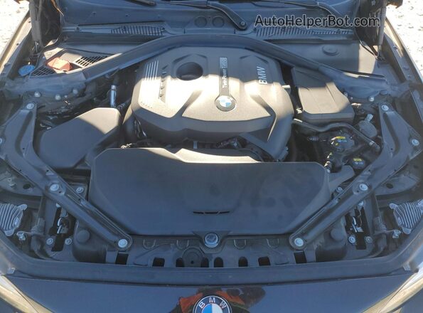 WBA2K1C05L7F99459 2020 BMW 2 SERIES Black უკანა სალონის ხედი