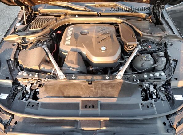 WBA43FJ06RCR97041 2024 BMW 5 SERIES Black უკანა სალონის ხედი