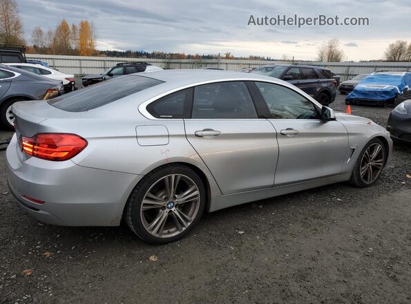 WBA4A9C54GG507248 2016 BMW 4 SERIES Silver Tył prawy