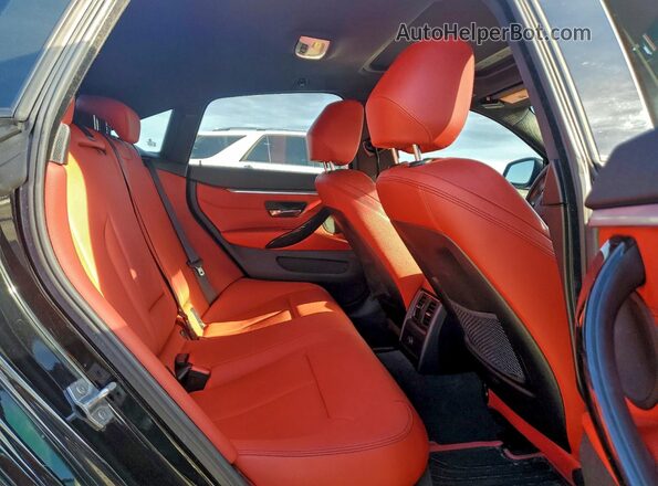 WBA4A9C58GG508256 2016 BMW 4 SERIES Black Vista de los asientos traseros