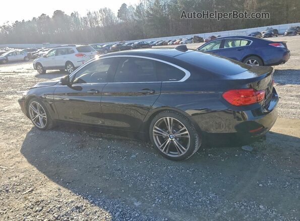 WBA4A9C58GG508256 2016 BMW 4 SERIES Black Trasero izquierdo
