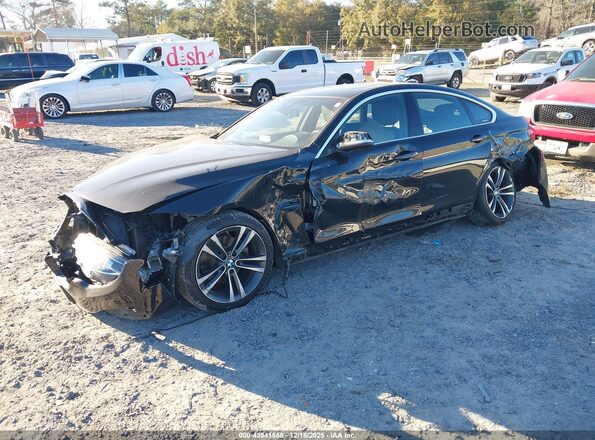 WBA4J3C08LBL11399 2020 BMW 4 SERIES Black Vista tres cuartos delantera izquierda