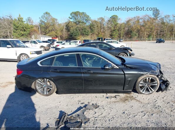 WBA4J3C08LBL11399 2020 BMW 4 SERIES Black Vista interior trasera
