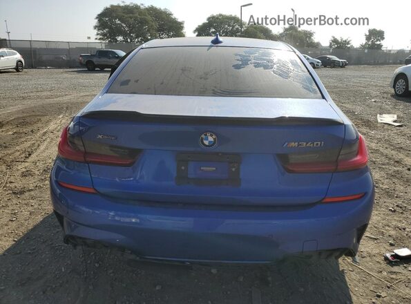 WBA5U9C08LFH20934 2020 BMW M3 Blue Հետևի տեսք