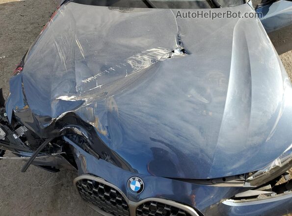 WBA63AT09NCH71436 2022 BMW M4 Blue Widok wnętrza z tyłu