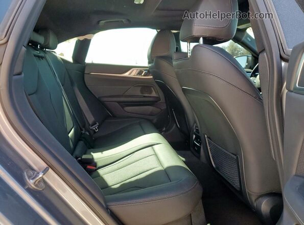WBA63AV03RFS34981 2024 BMW 4 SERIES Gray Vista de los asientos traseros