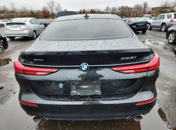 WBA73AK06L7F82058 2020 BMW 2 SERIES Black Rear view