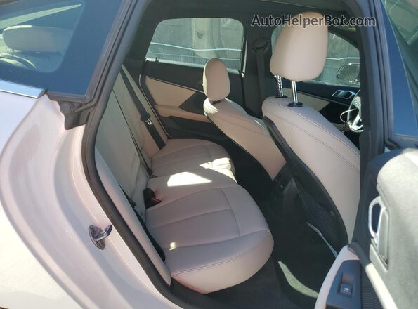 WBA73AK06L7F92394 2020 BMW 2 SERIES White Vista de los asientos traseros