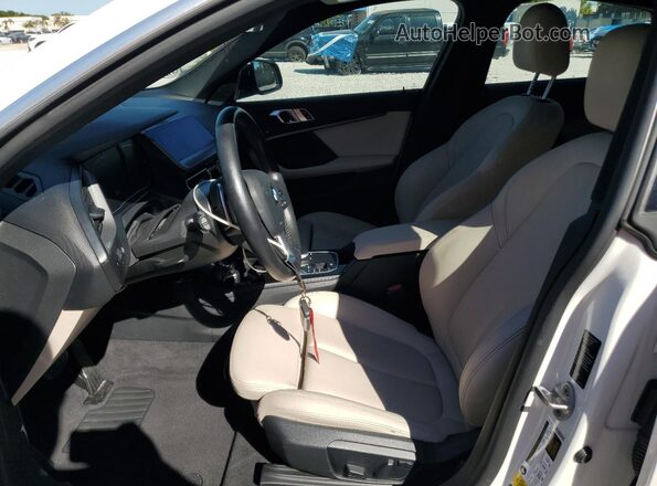 WBA73AK06L7F92394 2020 BMW 2 SERIES White Vista interior delantera